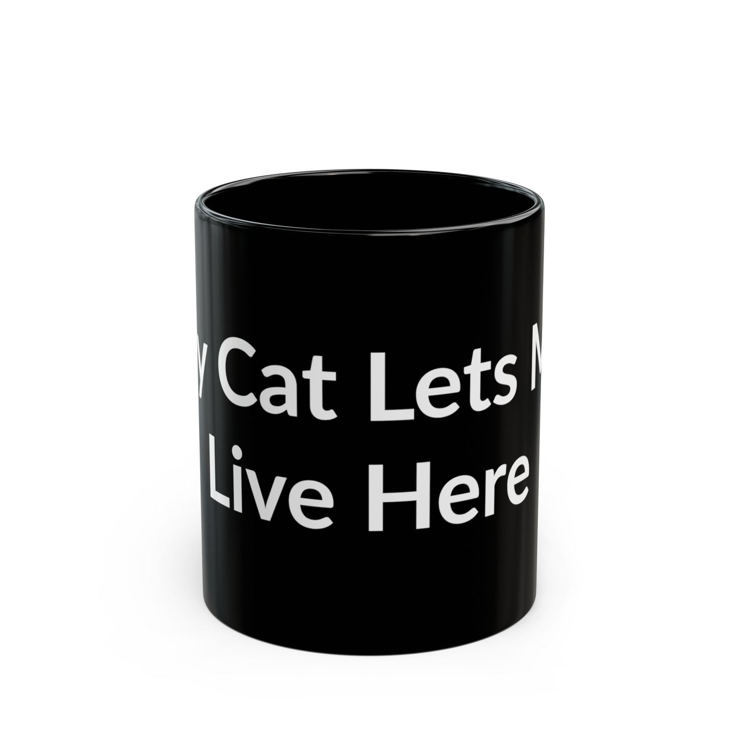 Black Mug - My Cat Lets Me Live Here