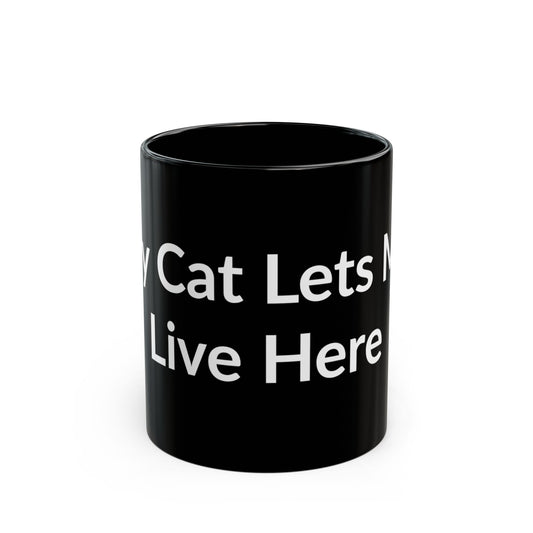 Black Mug - My Cat Lets Me Live Here