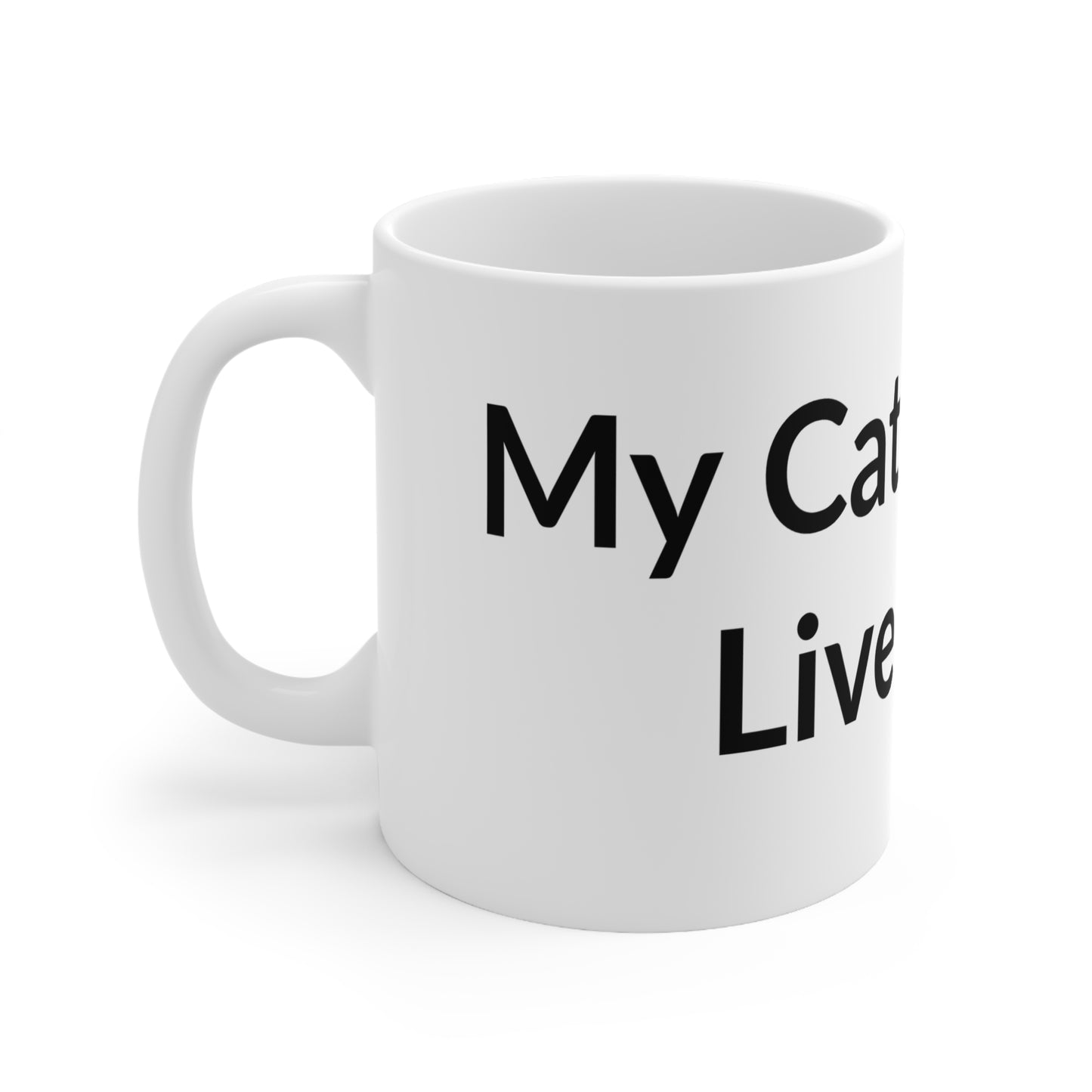 White Ceramic Coffee Cup - My Cat Lets Me Live Here