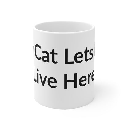 White Ceramic Coffee Cup - My Cat Lets Me Live Here