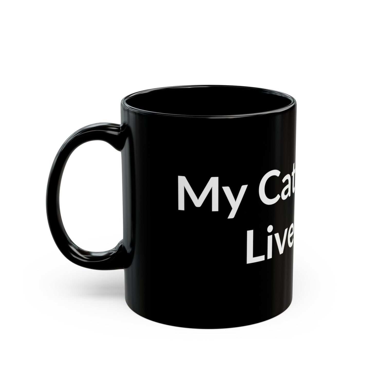 Black Mug - My Cat Lets Me Live Here